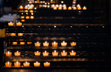 Row of candles in a church