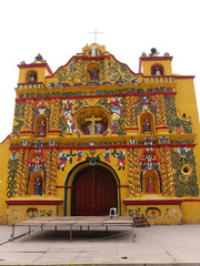 Fototapeta na wymiar Bright Yellow Church in San Andres Xecul, Guatemala