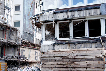 Fototapeta na wymiar Destruction and Demolishing an old building