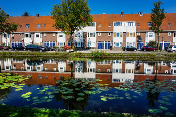 Fototapeta na wymiar Amsterdam day time, building and canal