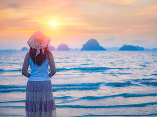 Lonely young woman on the beach,sad concept. Summer concept.