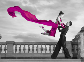 Pair of dancers dancing ballroom