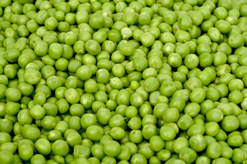 Green peas close-up may be used as background 