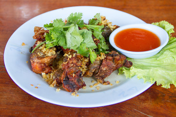 Fried frog in a dish