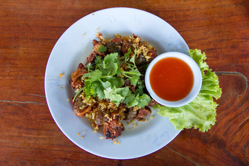Fried frog in a dish