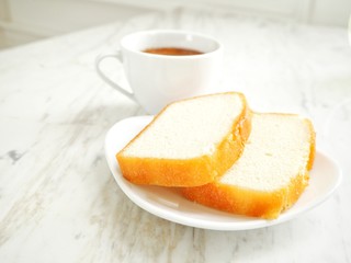 Butter cake with coffee cup