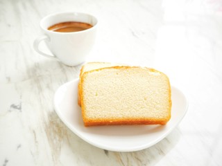Butter cake with coffee cup