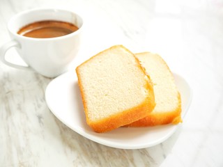 Butter cake with coffee cup