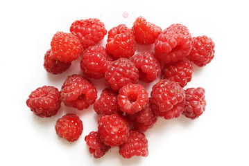 fresh raspberry -  red sweet berries on white background