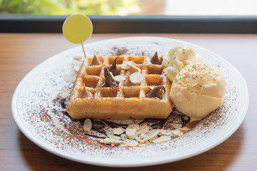 waffles with chocolate sauce and ice cream