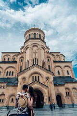 Young couple in love, hugging on the street.