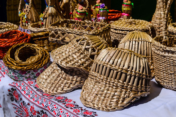Different wicker products for sale on a fair