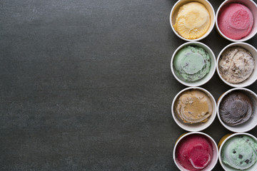 Top view Ice cream flavors in cup on blackground