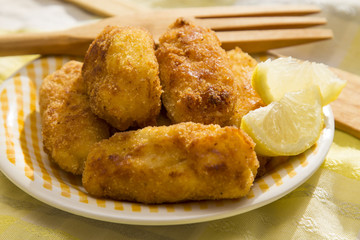 Plate of croquettes stuffed with lemon