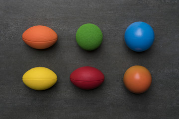 colorful of stress balls on black background