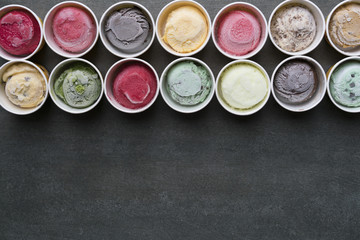 Top view Ice cream flavors in cup on blackground