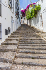 Long staircase in a whitewashed street in Altea © venemama