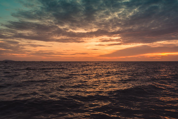 Sunset sky and cloud at the beach, sky background.