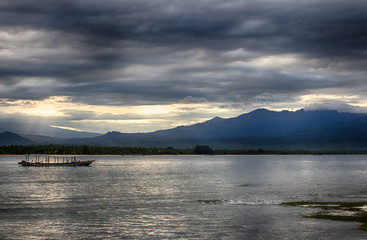 Dark sky over the ocean, the Small island of GILI Indonesia. Of the Indian ocean.