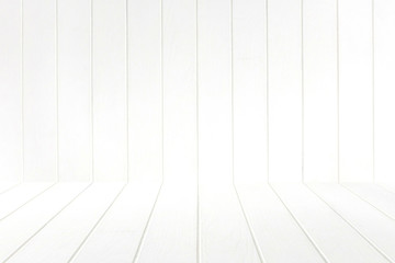 Empty room with white wall and wooden floor.