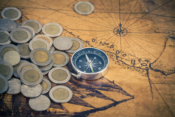 Fototapeta na wymiar treasure, map, ancient, skull, background, golden, brass, compass, pirate, gold, wealth, discover, vintage, retro, old, chest, yellow, travel, grunge, antique, money, east, south, voyage, discovery