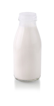 Open glass bottle with milk with shadow isolated on white