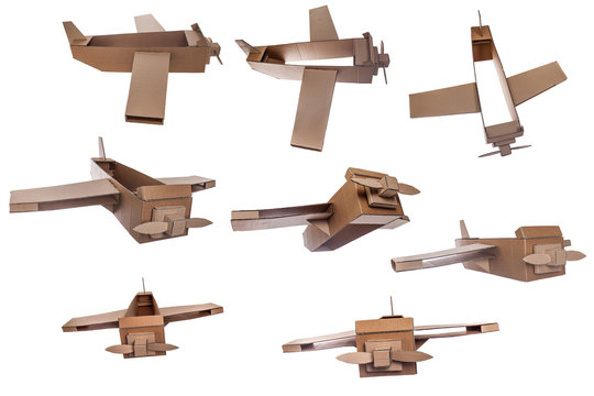 cardboard airplane on white