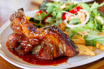 Pork ribs with salad