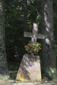 stone cross in mountain
