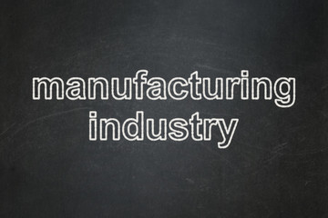Fototapeta premium Manufacuring concept: Manufacturing Industry on chalkboard background