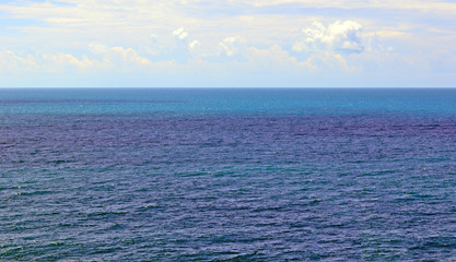 Seascape with a horizon line between sea and sky, background