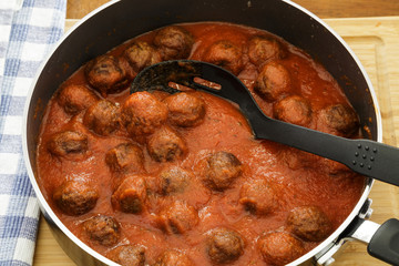 Meatballs Simmering in Tomato Sauce