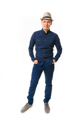 Young man in blue clothes on a white background.