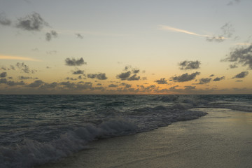 Dramatic sunset over tropical beach and sea