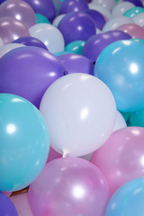 turquoise background with balloons