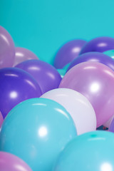 turquoise background with balloons
