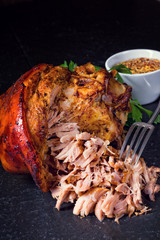 fresh roasted knuckle of pork with mustard