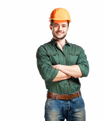 Young construction workers in hard hats