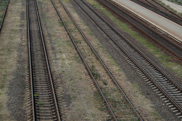 Fototapeta na wymiar Old railroad track. Rails lines on concrete sleepers.
