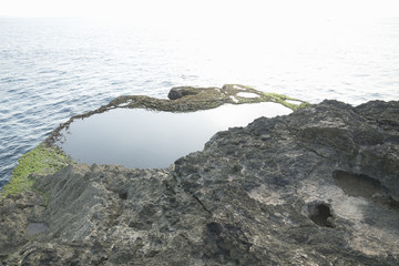 Fototapeta na wymiar Natural Pool at devil's tears cliff Nusa Lembongan, Bali, Indonesia