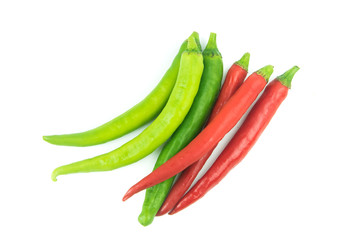 green and red chili pepper on a white background