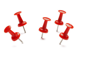 Push pins isolated on white background.