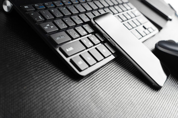 keyboard with mobile phone on the table