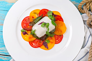 Fresh Italian Caprese salad on a plate