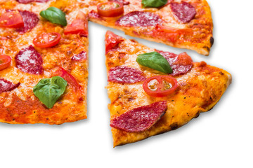 Delicious pizza with pepperoni and tomatoes