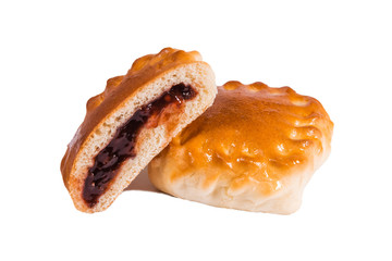 baked pies with sweet filling, cut, dark berry jam, jam, white background, isolate, bakery