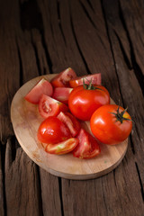 Tomato on a wooden background