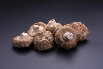 Shiitake mushrooms on a black table