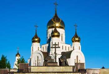 Fototapeta premium Christian Orthodox Church on background of blue sky, the Cathedral of the resurrection of Christ, Russia, Khanty-Mansiysk