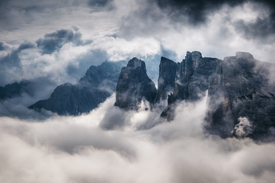 Fototapeta Great view of the foggy valley.  Location National Park Tre Cime di Lavaredo